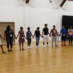 Cadets hold hands during the 2017 Conference Icebreaker.